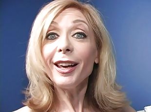 Mature blonde Nina Hartley gives BBC-sucking tutorial in gloryhole vid