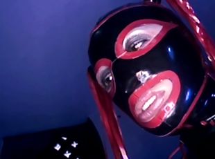 Aroused woman endures heavy latex fantasy by getting fucked in hardcore