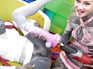 Tattooed trans sissy gets ass fucked with a strap-on