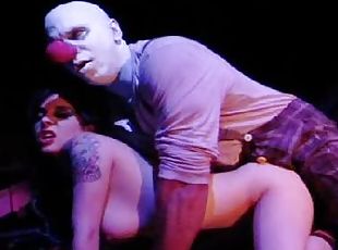 Man in clown makeup fucks a babe