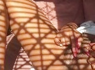 Faceless kitty making herself cum in the sun