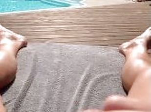 Fisting slut jerking off pool side