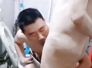 Asian man and grandfather in the bathroom.