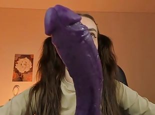 Camgirl Deepthroats Purple Dildo