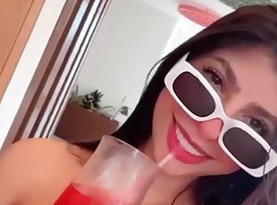 Solo brunette chick drinking and having fun in a homemade video