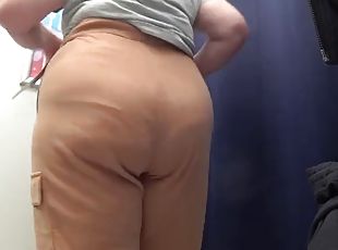 The camera in the fitting room watches a mature big ass in satin panties. Curvy milf changes clothes. PAWG