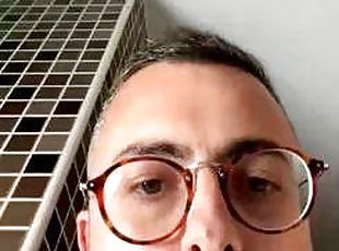 Guy with glasses cumming in the bathroom
