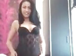 Homemade video of a brunette chick with natural boobs wearing lingerie