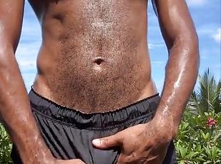 Stroking my hairy uncut black cock in public