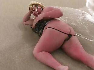 Monica Richard flashing at the beach