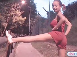 Busty teen jiggles her big tits in public