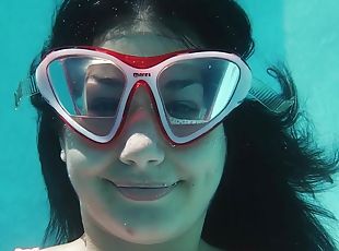 Sexy one piece swimsuit on a girl working out underwater