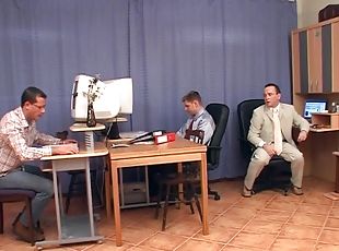 Sexy office assistant does a gangbang with her bosses