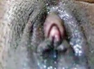 Amateur masturbation of a black pussy