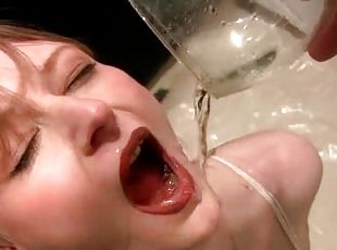 Kinky blonde tramp filling three glasses with her piss