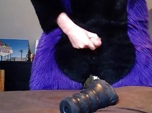 Lucer cums on his toy.