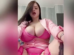 Busty babe plays with her big boobs