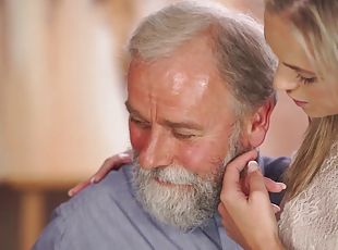 Middle-aged teacher and student have good time at his home