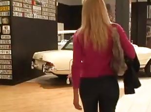 Stunning Sophie Moone walks around the car exhibition