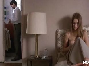 Brunette Joana Preiss Laying Topless On a Bed - 'Dans Paris' Scene