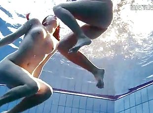 Naked girls swimming erotically underwater