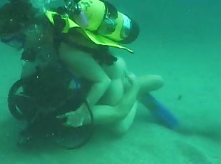 Kinky Jessica gives hot blowjob under the water while diving