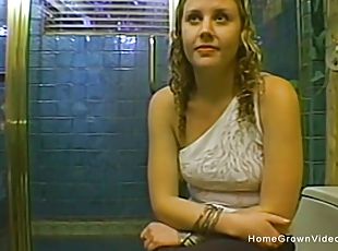 Hot  blonde jerks her boyfriends big cock in the bathroom