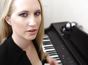 Piano playing cutie reveals her natural tits