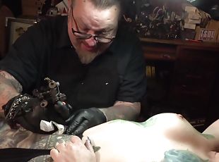 Marie Bossette gets a painful tattoo on her leg