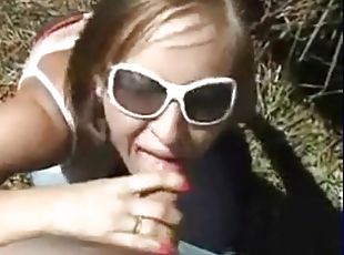 Outdoor blowjob from eager girl in gunglasses