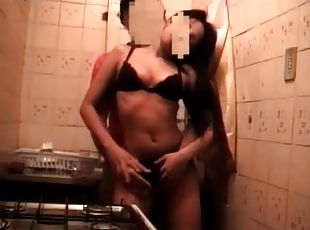 Lustful amateur couple enjoy sex in the kitchen