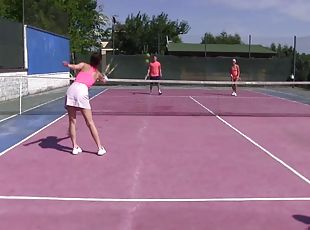 Amazing foursome game with brunettes on a tennis court