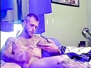 Sexy tattooed guy with big dick masturbates